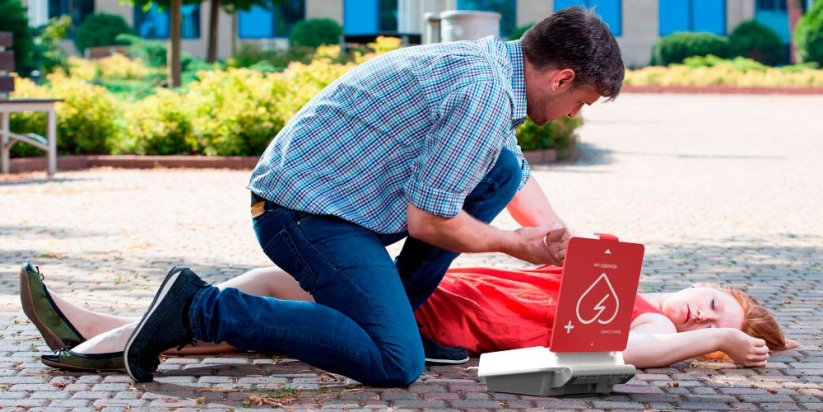 AED Defibrilátor, Reanibex 100 + Kovová AED skřínka s alarmem (bílá) + Resuscitační (KPR) set